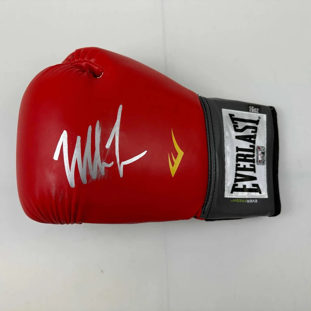 Red Everlast boxing glove with silver signature for authentic boxing gear style