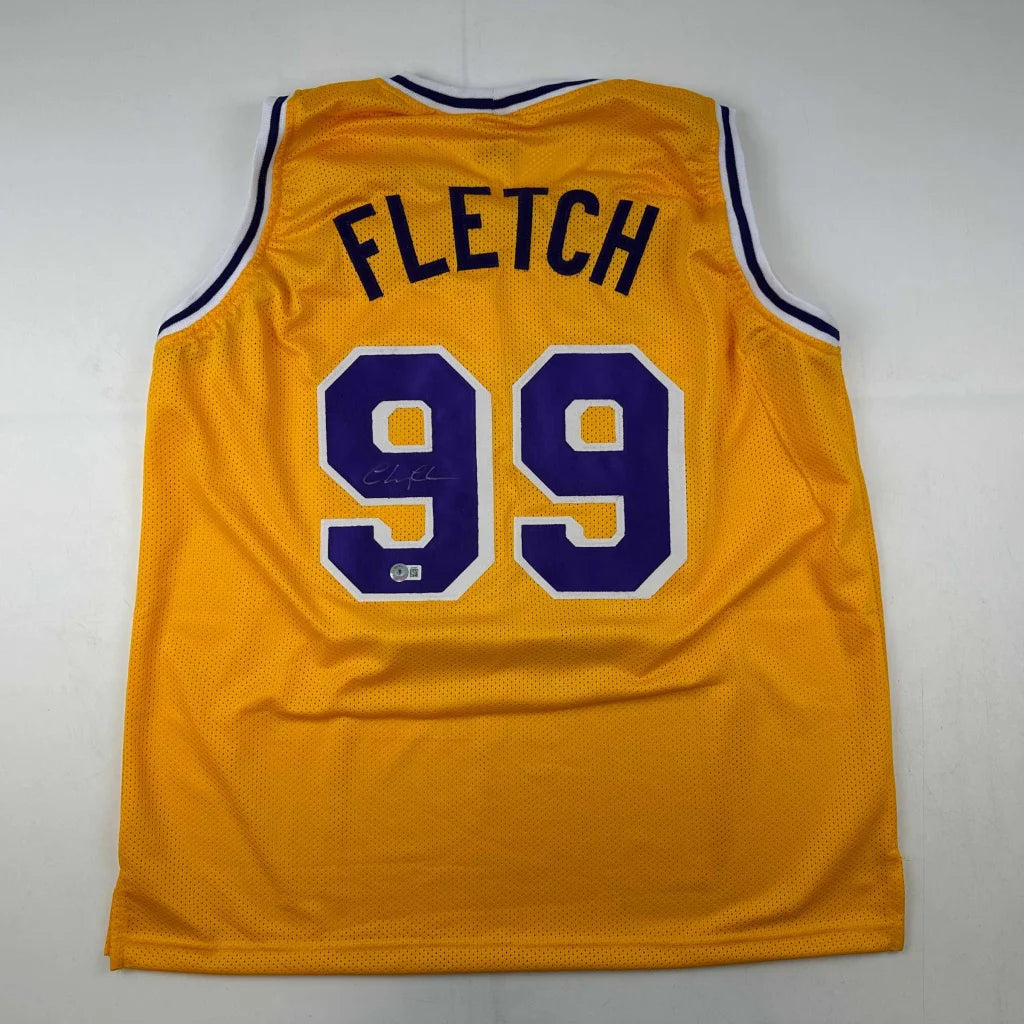 Yellow basketball jersey with purple and white numbers from Authentic FLETCH 99 custom jersey collection for professional sports fans
