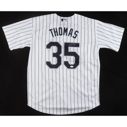 Autographed White Pinstripe Baseball Jersey with Black Numbers signed by Frank Thomas