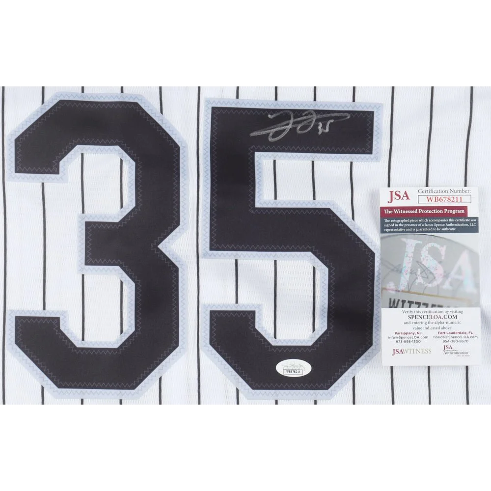 White baseball jersey with black 35 number and Frank Thomas signature for sale