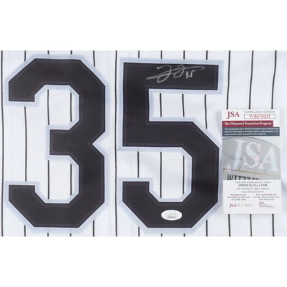 White baseball jersey with black 35 number and Frank Thomas signature for sale