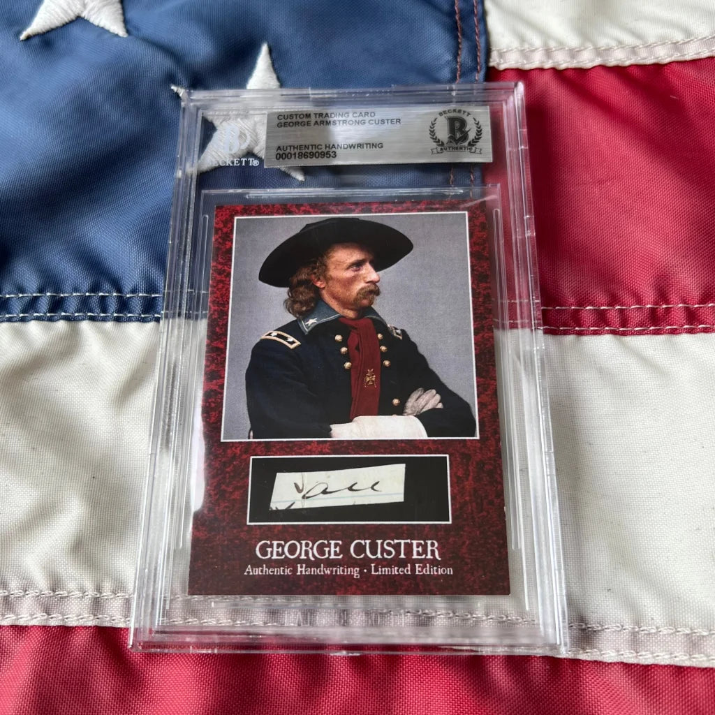 A framed authentic george custer words graded card showing lieutenant colonel custer in dark uniform with gold buttons