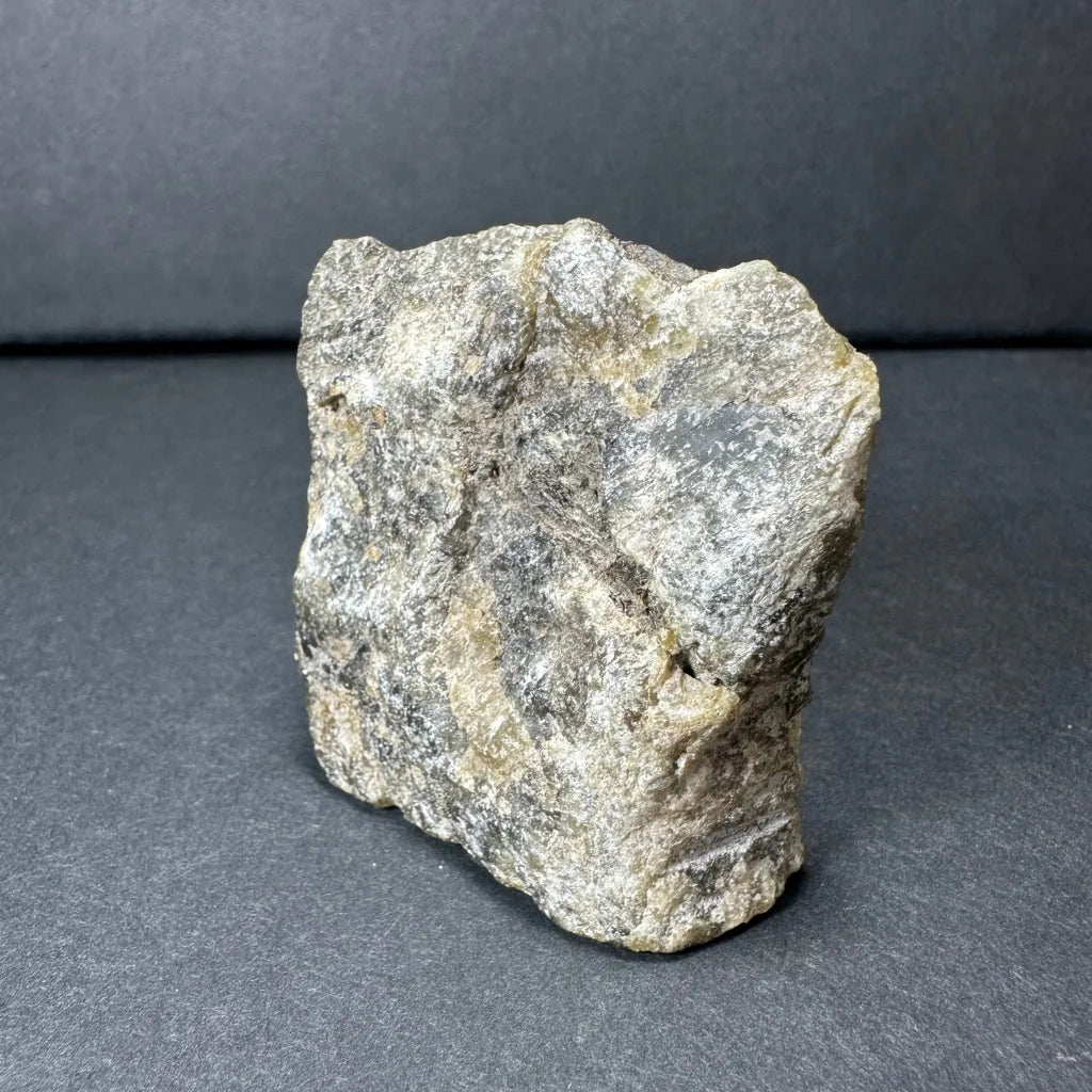 Rough gray mottled Madagascar labradorite crystal specimen