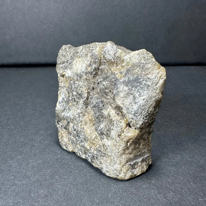 Rough gray mottled Madagascar labradorite crystal specimen