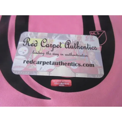 Pink and black Messi Inter Miami signed jersey with RCA COA sticker for collectors