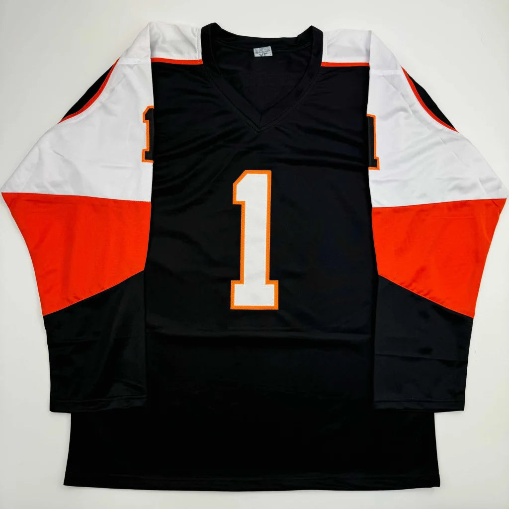 Black custom jersey with orange and white accents for professional sports fans