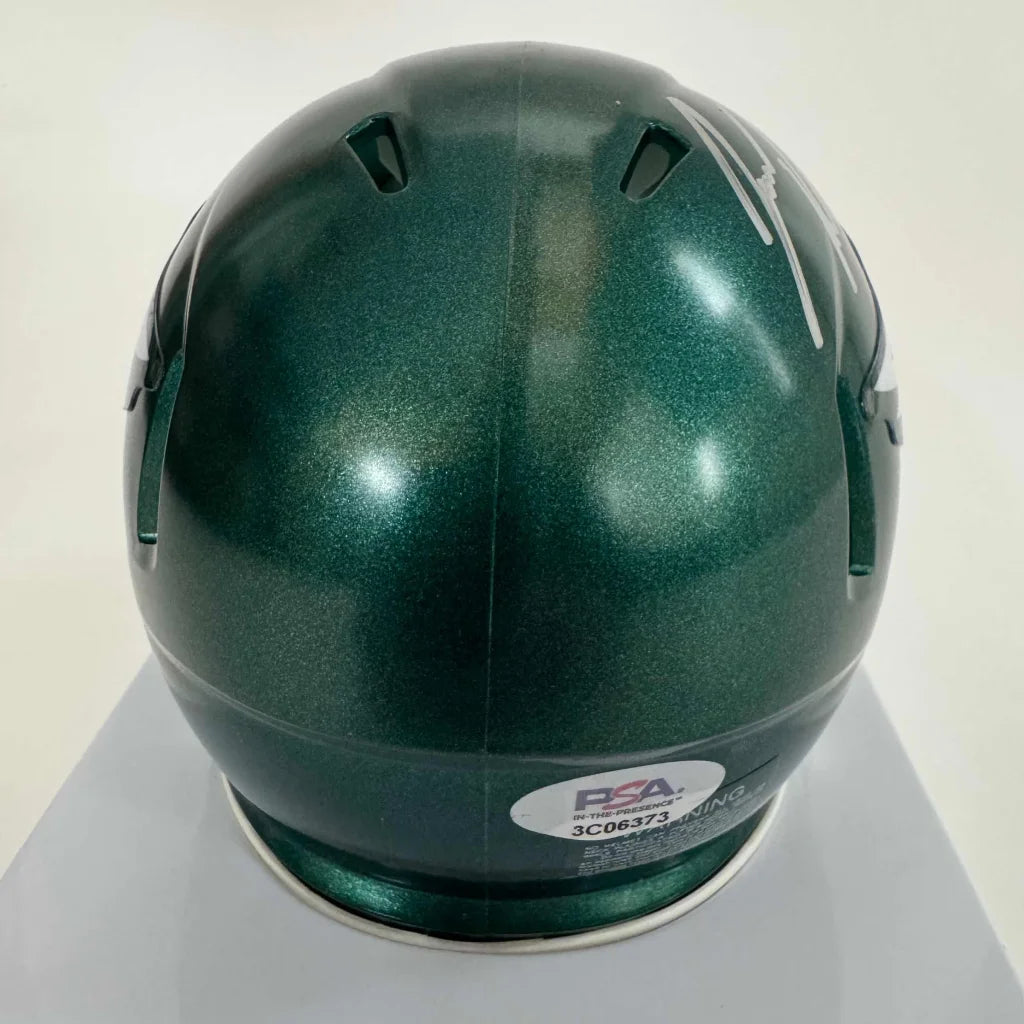 Dark green Philadelphia Eagles mini helmet with silver autograph and authentication sticker