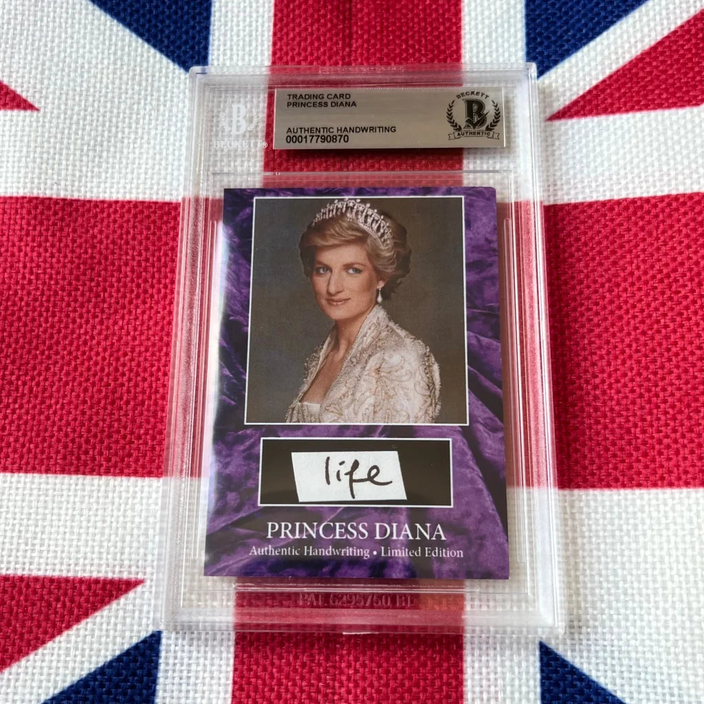 A purple trading card of princess diana in a white lace gown encased in a clear slab with an authentic handwritten letter label