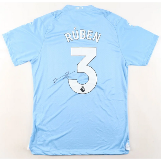 Light blue PUMA jersey signed by Ruben Dias with RÚBEN and 3 on the back