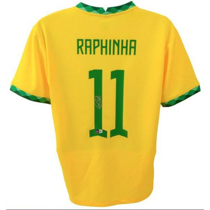 Yellow and green Brazil football jersey with Raphinha 11 signature and Beckett COA