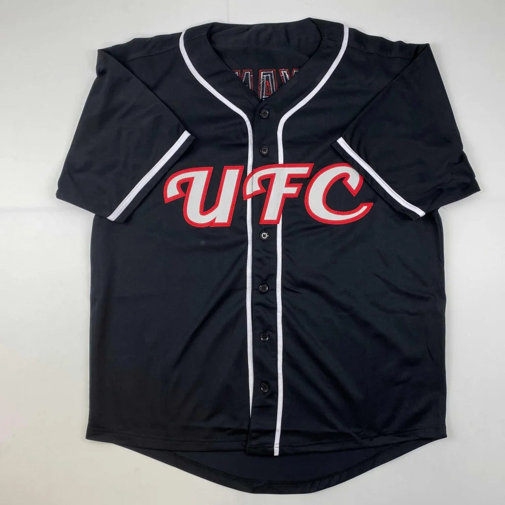 Black short-sleeved baseball jersey with white piping and red UFC lettering