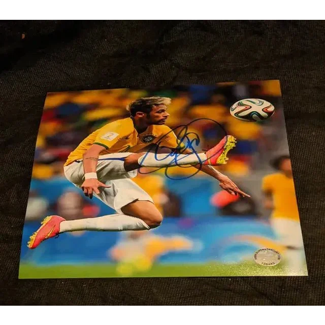 Autographed 8x10 photo of soccer star in yellow jersey for Authentic Soccer Star product