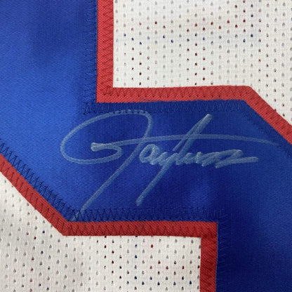 White, blue, and red Custom Jersey with signature from a professional sports athlete