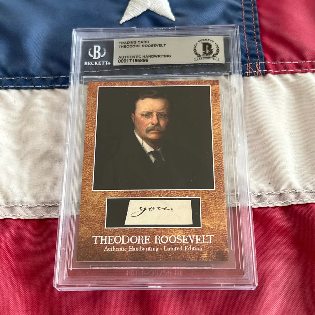 A graded Theodore Roosevelt trading card with Roosevelt words and an authentic piece