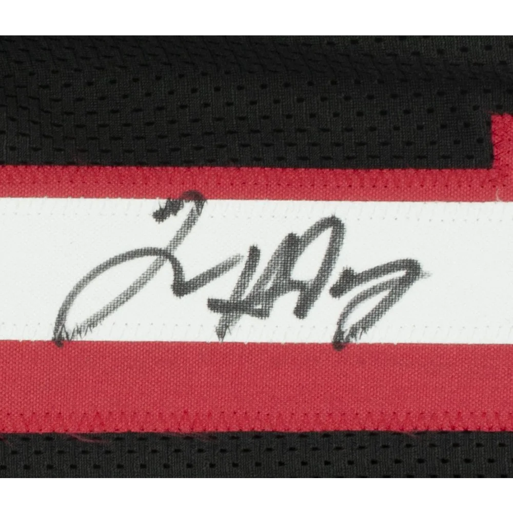 Black and red Tim Hardaway signed basketball jersey with JSA COA