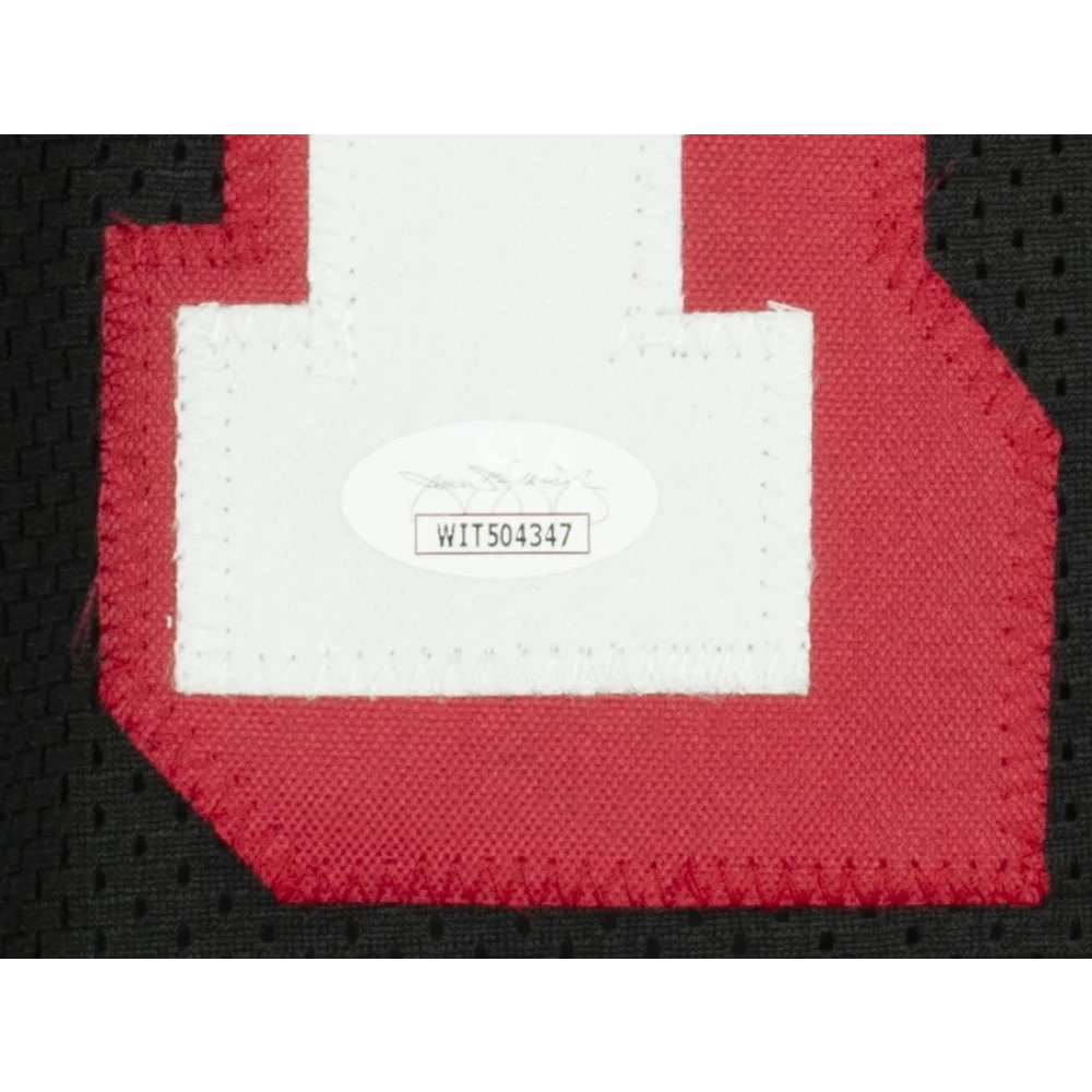 Tim Hardaway signed black basketball jersey with red and white patch and JSA COA