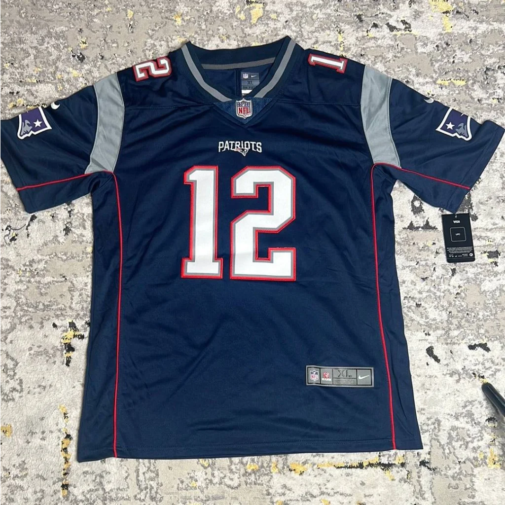 Navy blue New England Patriots jersey with number 12, autographed official Tom Brady gear