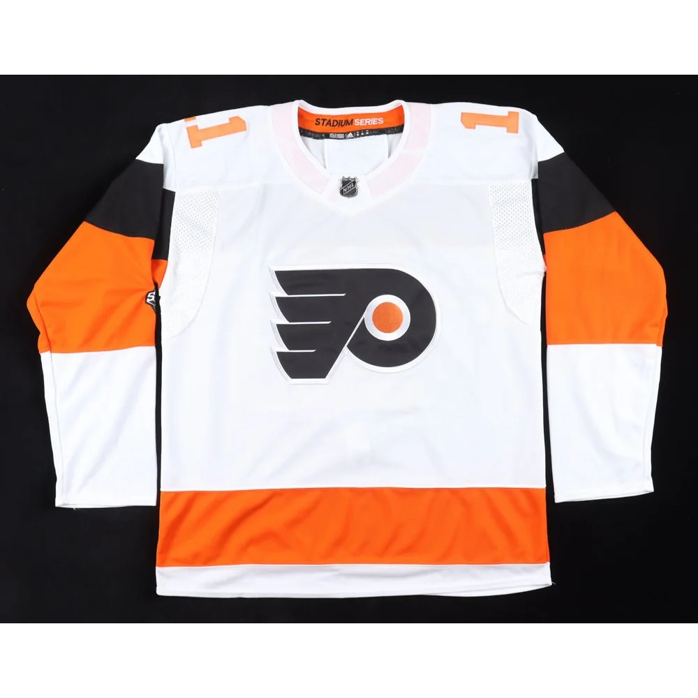 White, orange, and black Philadelphia Flyers jersey signed by Travis Konecny