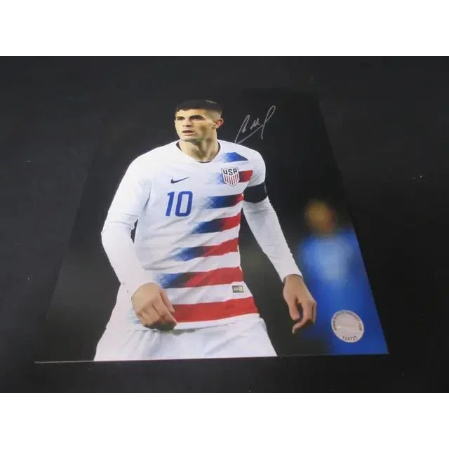 Autographed USA Christian Pulisic soccer jersey with COA, perfect for Team USA fans