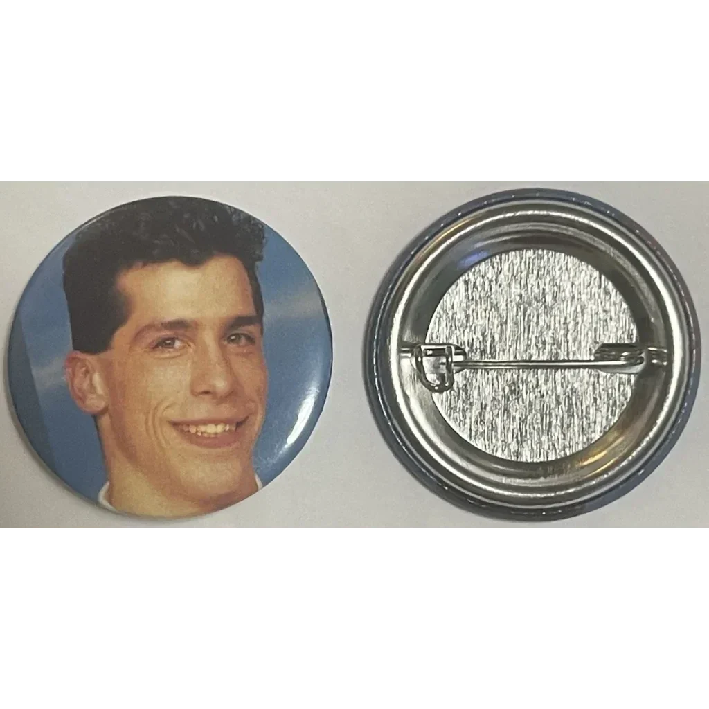 Smiling young man on an Authentic Vintage NKOTB Danny Wood button for 80s nostalgia