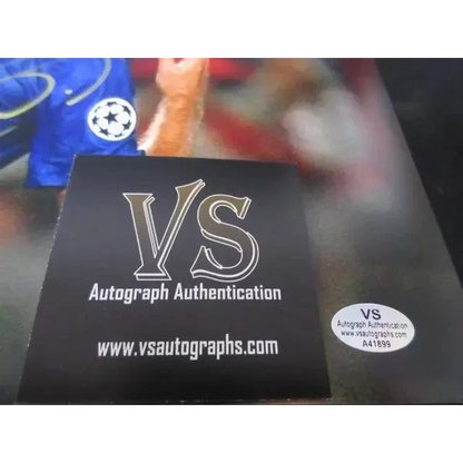 Authentic autograph authentication label on Xavi Barcelona signed 8x10 photo