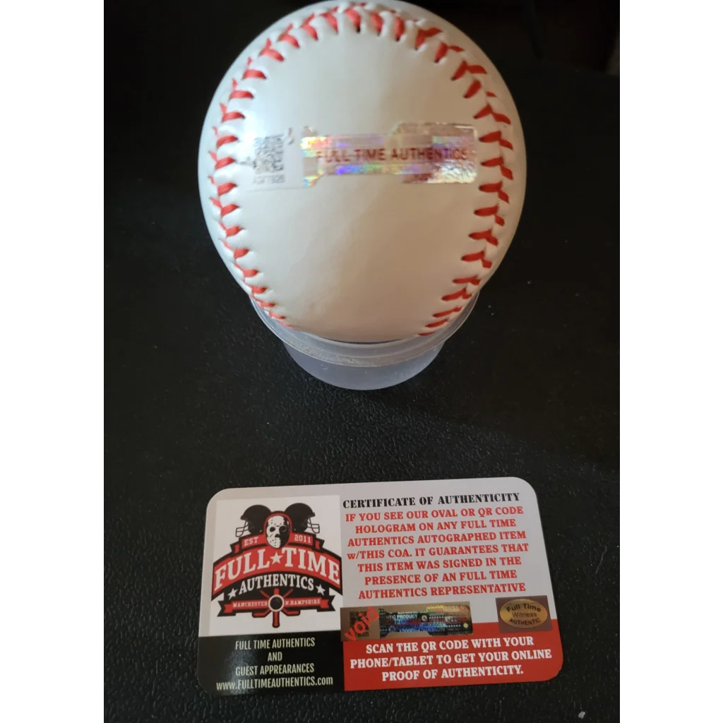 White Yankees autographed Rawlings baseball with red stitching and hologram authenticity sticker