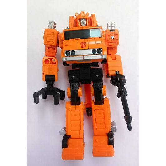 Autobot Grapple Transformers action figure in orange black vehicle mode