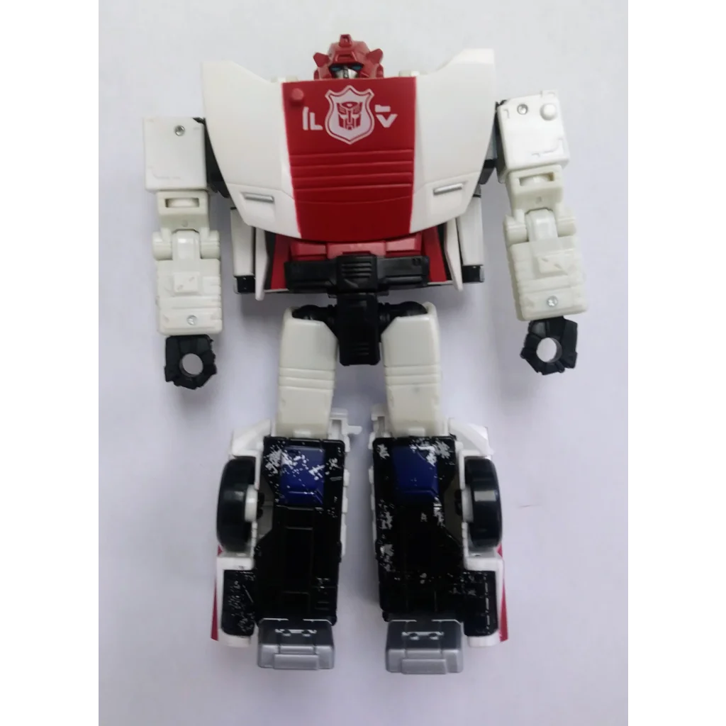 Autobot Red Alert Transformers action figure with red accents and shield