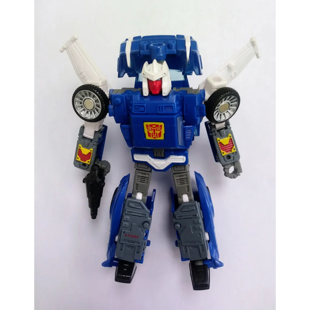Blue and white Autobot Tracks Transformers action figure with yellow accents