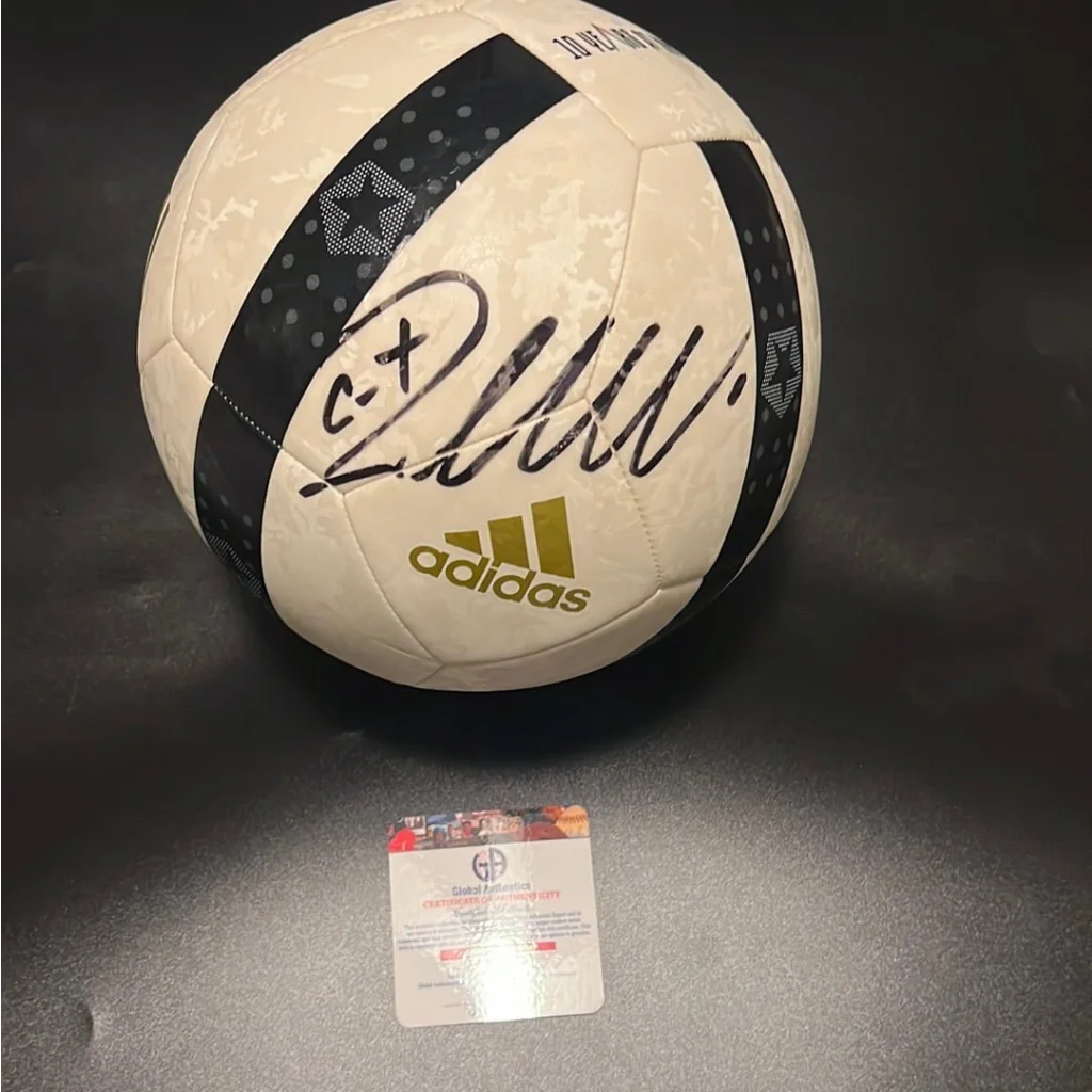 Autographed adidas soccer ball with COA and Juventus gold lettering on black and white design