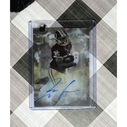 Autographed football card from Prestige Worldwide Collectibles in sleeve