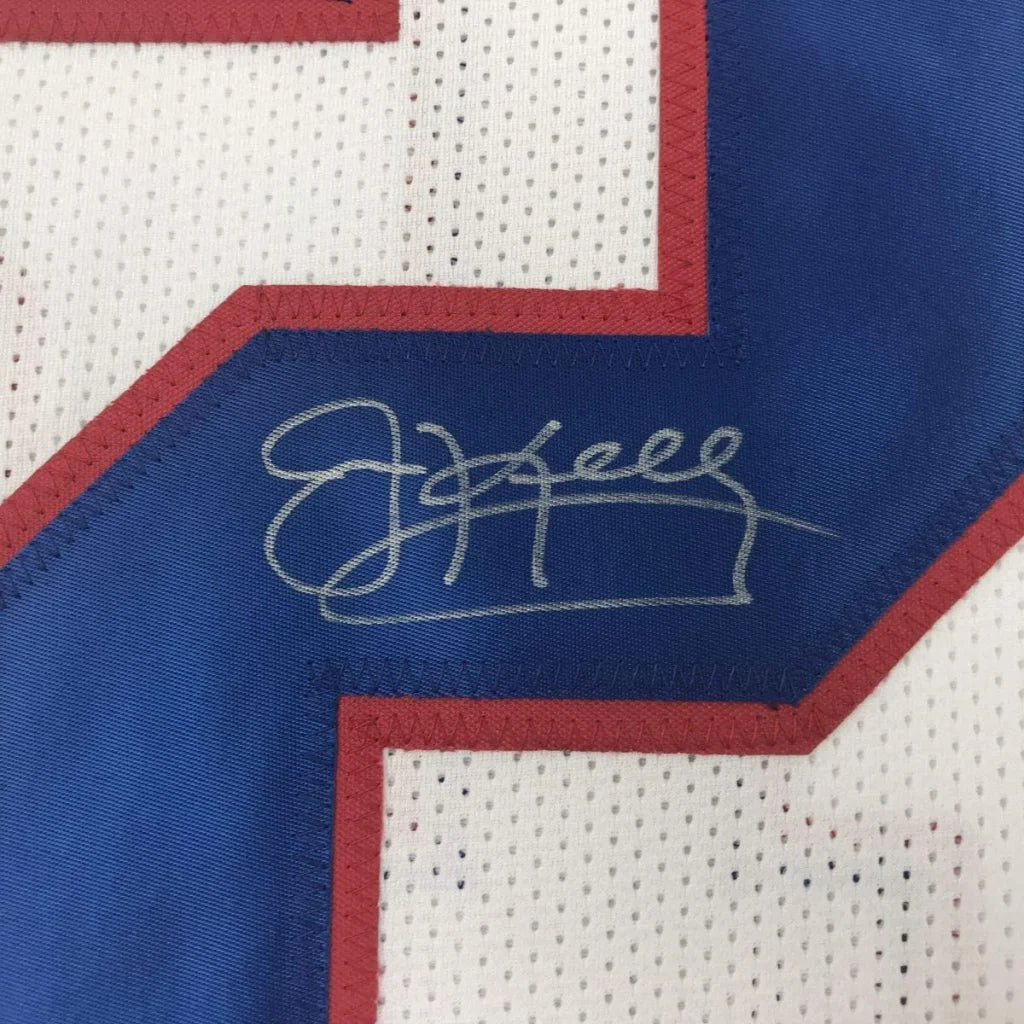 Autographed white custom jersey with blue red trim from Kelly 12 football team