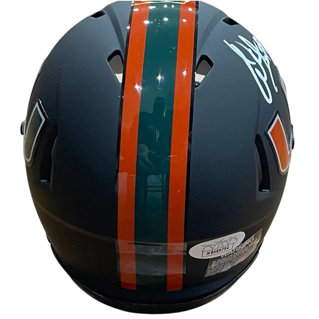 Autographed Miami Hurricanes Warren Sapp mini helmet in matte black with orange teal stripes