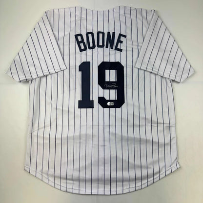White pinstripe custom jersey with BOONE 19 for professional sports collectors