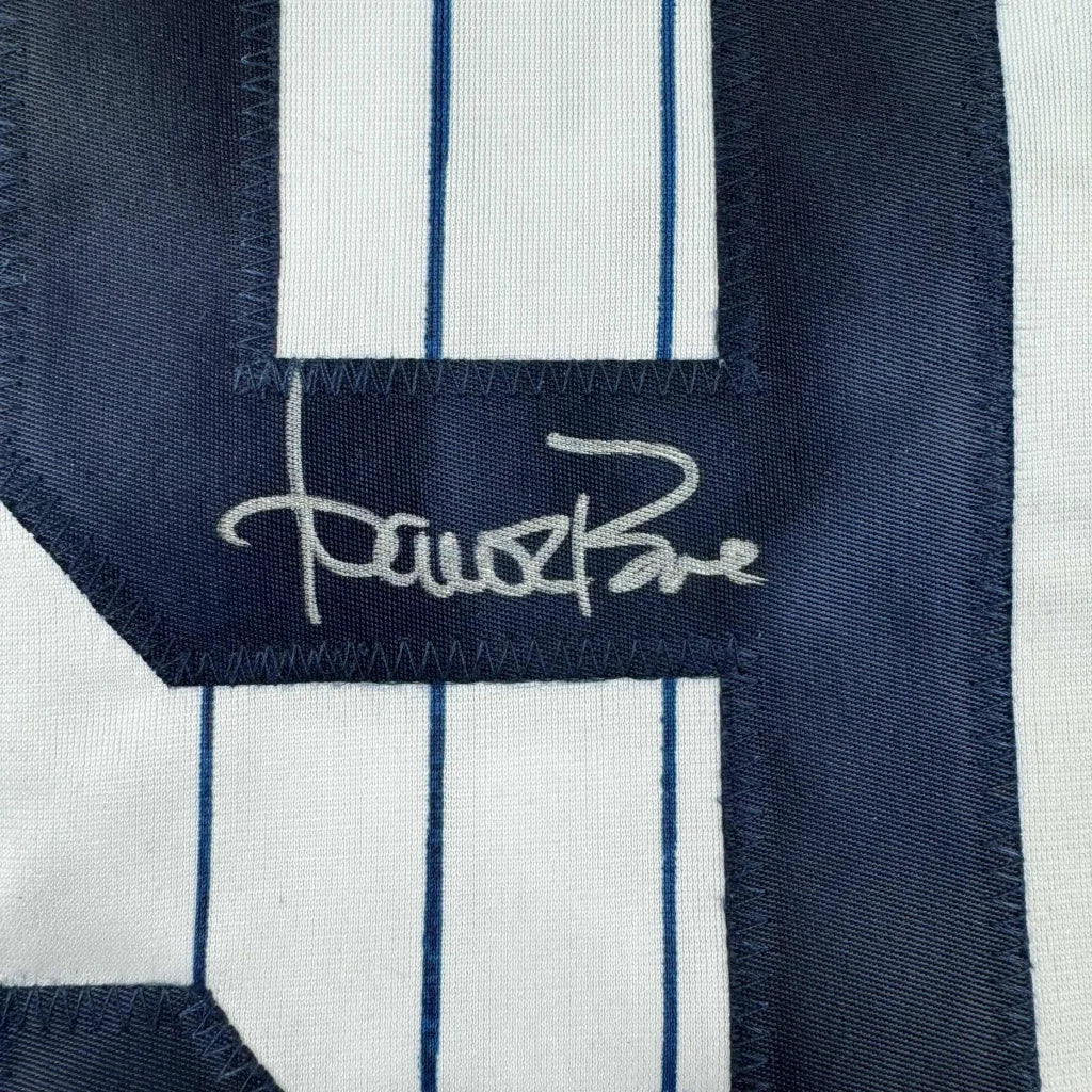 Autographed custom jersey with pinstripes and dark blue numbers from professional sports league