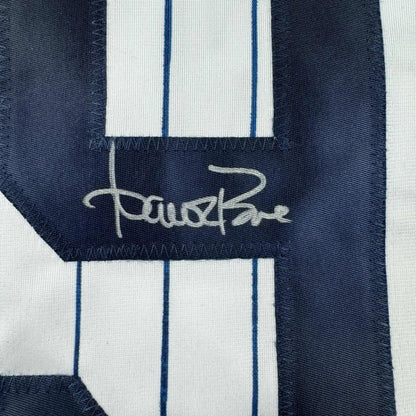 Autographed custom jersey with pinstripes and dark blue numbers from professional sports league