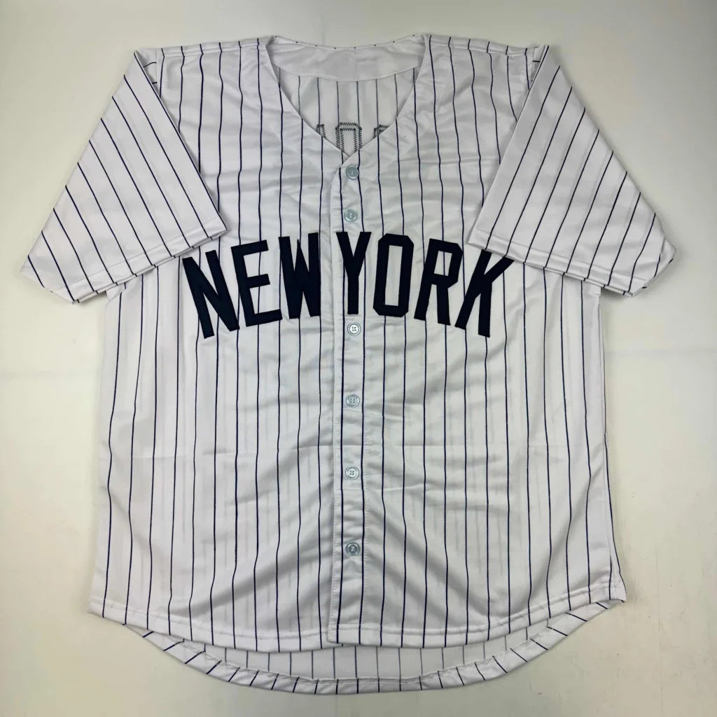White pinstriped custom jersey with NEW YORK text from a professional sports league collectible