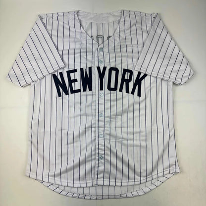 White pinstriped custom jersey with NEW YORK text from a professional sports league collectible
