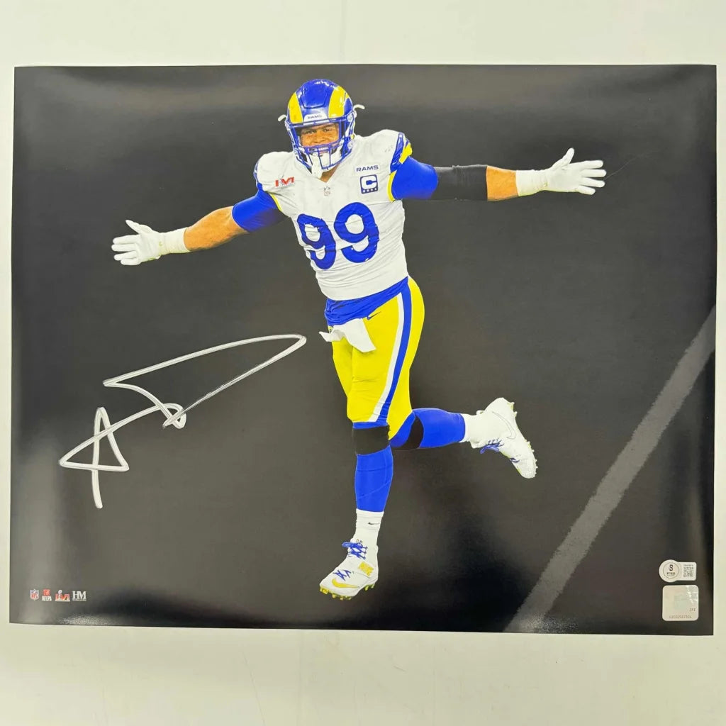 Signed Aaron Donald LA Rams 16x20 photo in white blue yellow uniform number 99