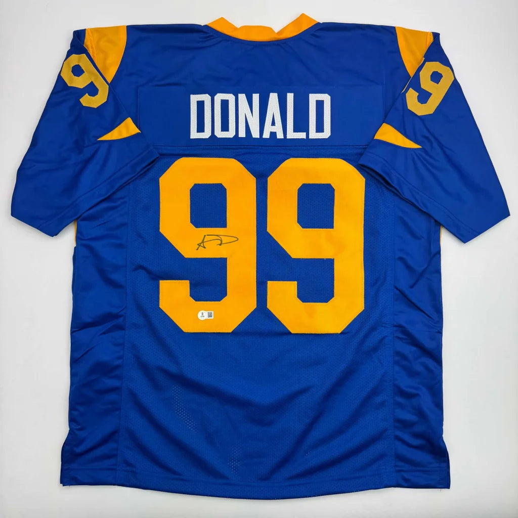 Blue and gold custom jersey from Professional Sports League with signature and hologram