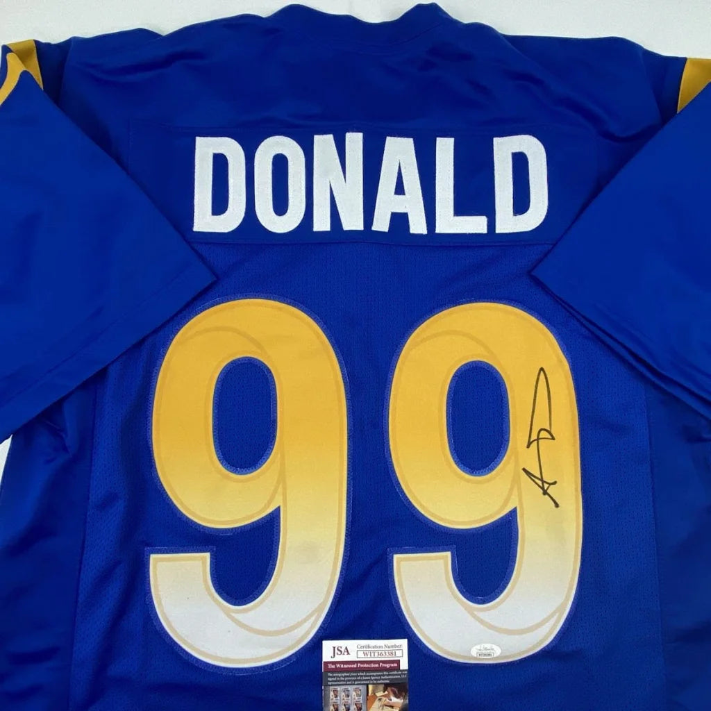 Back of blue and gold los angeles rams custom jersey with donald 99 and signature signed professional sports jersey