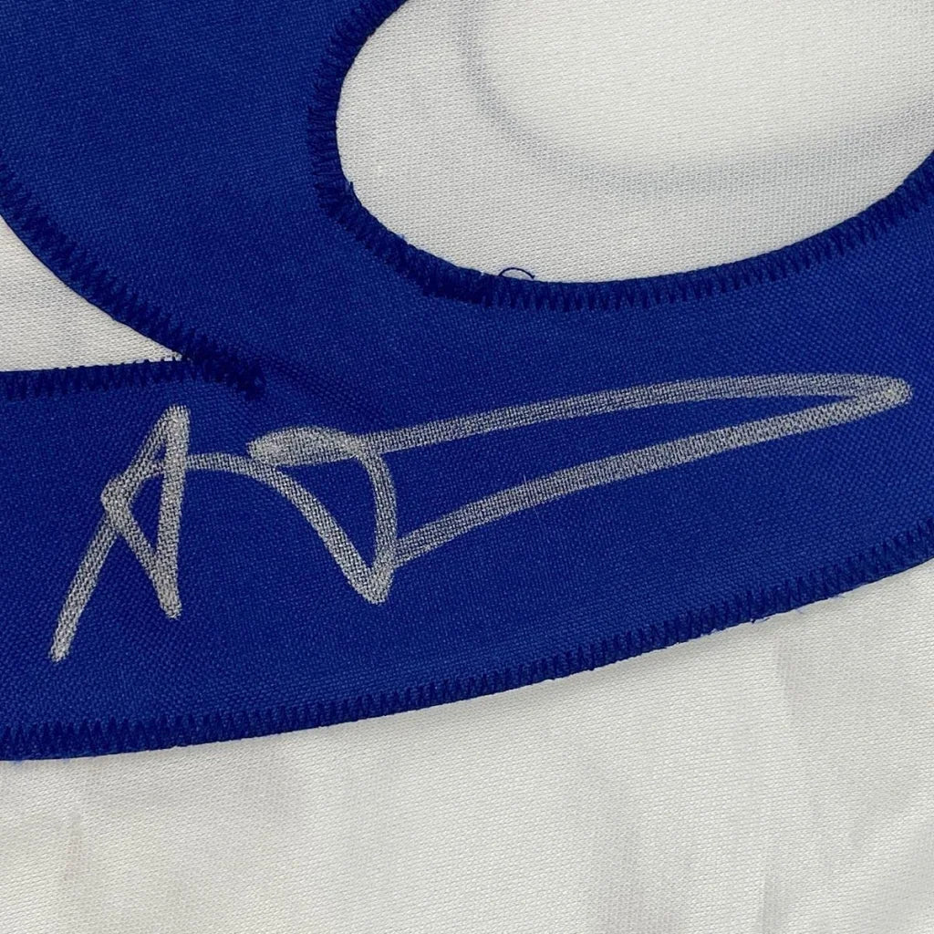 Blue custom jersey from Professional Sports League with white embroidery and signature