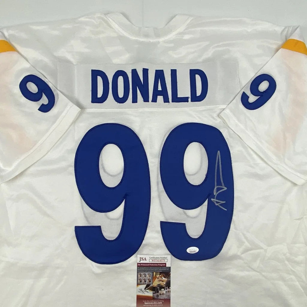 Autographed white custom jersey from professional sports league with DONALD 99 lettering