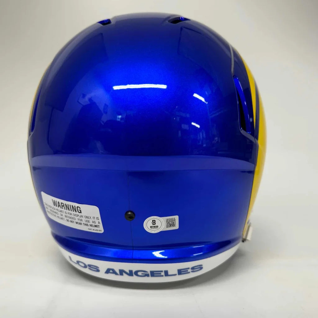 Blue and yellow LA Rams helmet with third party authentication and white chin strap