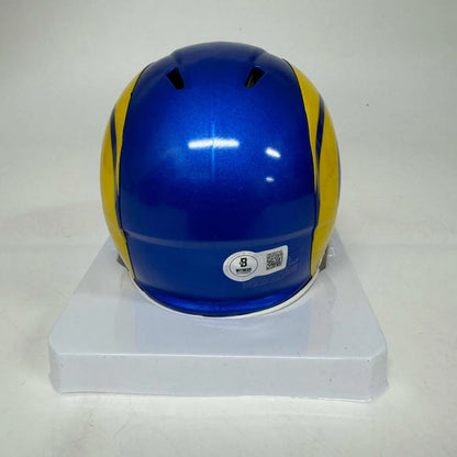 Blue and yellow football helmet from the Authentic Autographed Los Angeles Rams Mini Helmet with Display Case