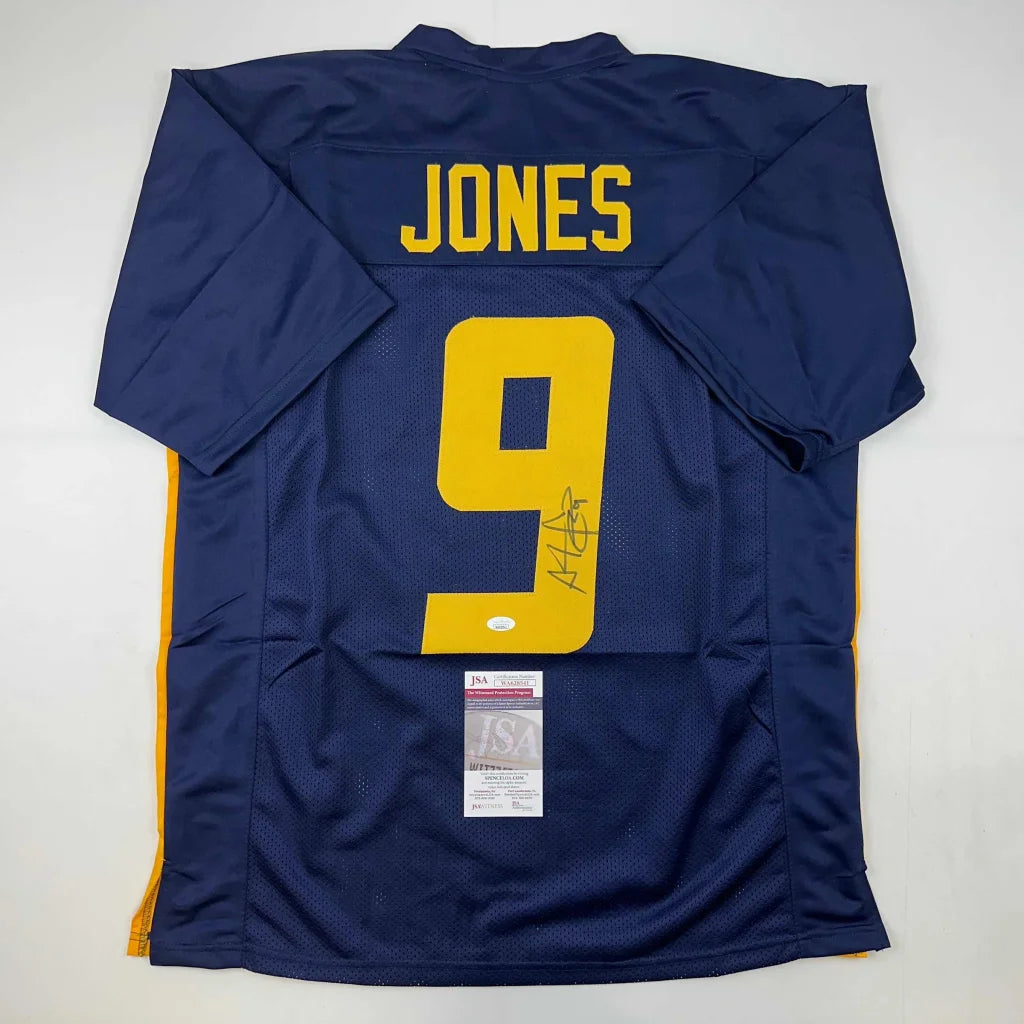 Navy blue custom sports jersey with JONES and 9, autograph, auth sticker from Professional Sports League