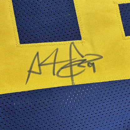 Autographed blue and yellow custom jersey from Professional Sports League display