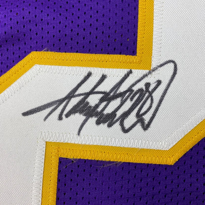 Purple and gold mesh Adrian Peterson signed Vikings jersey from the professional sports league