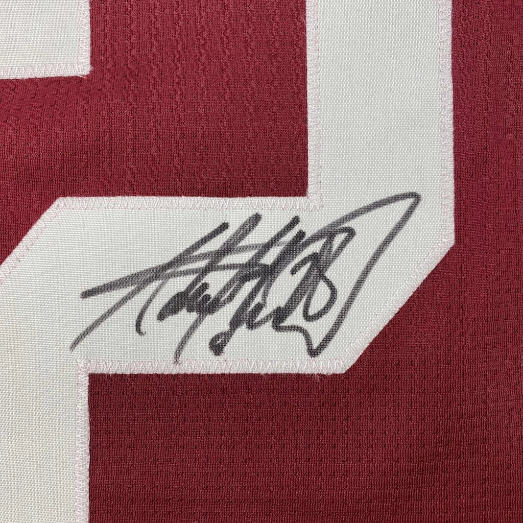 Autographed Adrian Peterson custom jersey on maroon Oklahoma football patch
