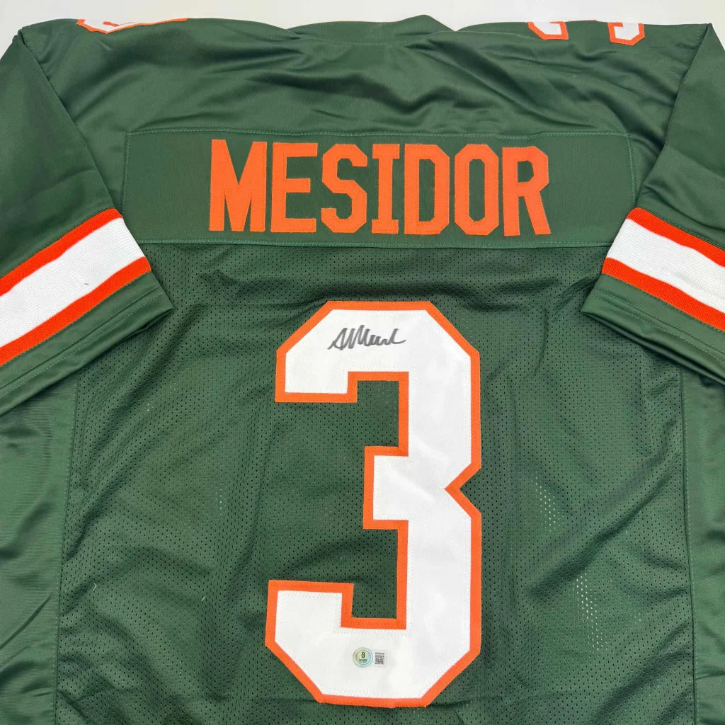 Autographed Akheem Mesidor Miami Green College Football Jersey Beckett BAS COA | Certified Authentic Signed Memorabilia | vintageantiquesgifts.com